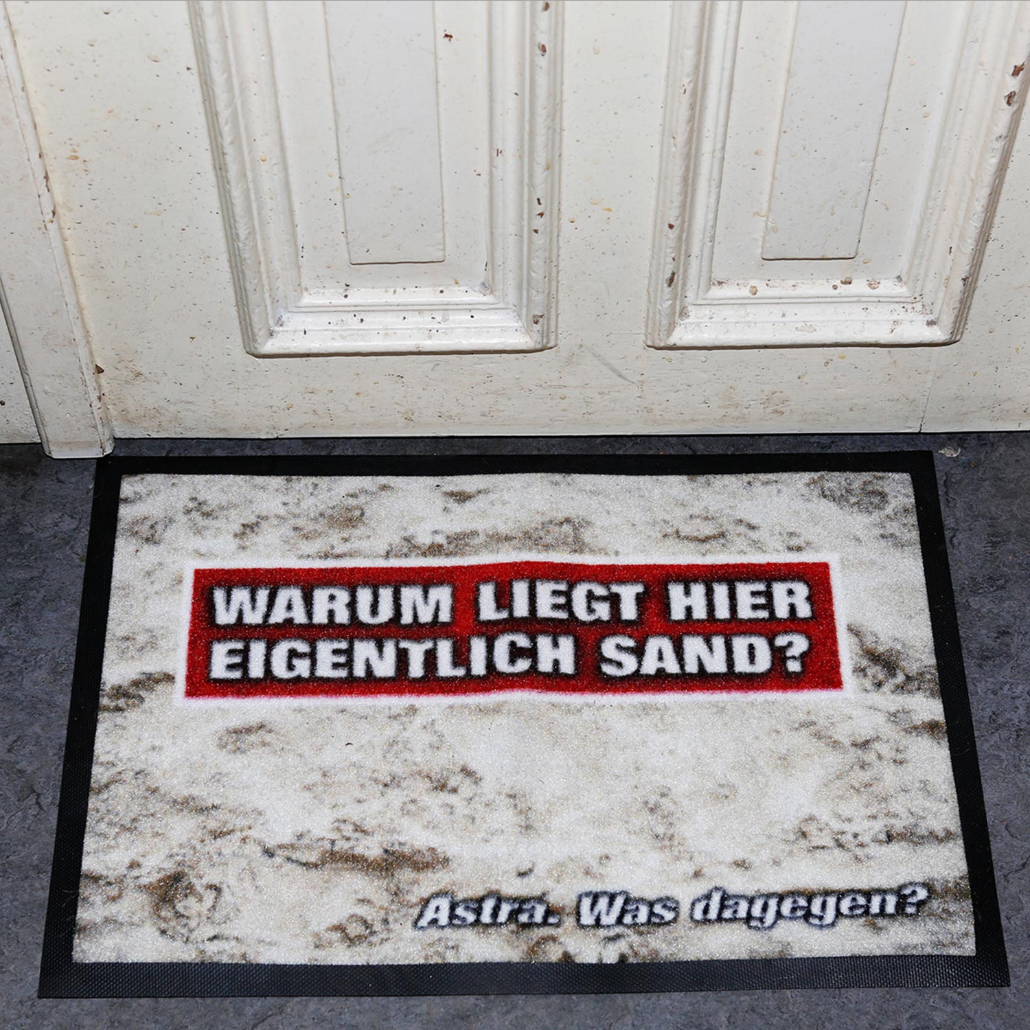 Fußmatte „Warum liegt hier eigentlich Sand?“